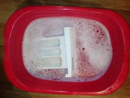 Reinig de wasmachine: de verontreiniging van de afvoer filter, schaal, roestige plak te verwijderen